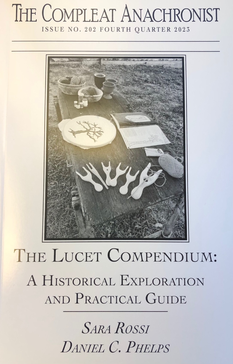 Product Description: Compleat Anachronist #202 - Fourth Quarter 2023:The Lucet Compendium: A Historical Exploration and Practical Guide</br></br>Several techniques for making braids with fingers or tools have existed for thousands of years, many of which are still in use today. The lucet is said to be one of those braiding tools of ancient origin, a device used to help speed up a process that could be done on the fingers of one’s hand but is nowadays mainly given over to machinery. A lucet is a handheld tool whose main features are two prongs, or horns, on top. Those two protruding finials are used to braid a cord whose length is not predetermined; crafters can freely establish the desired length as they go without the need to pre-cut the yarn. Lucet-made cords are square in sections, slightly elastic, and strong. They can be used for a variety of purposes, from practical uses like laces and bag handles to ornamental purposes such as jewelry and embellishments.</br></br>Although many people in the SCA use lucets to create cords, the history of the lucet is rather unclear, with archaeologists and researchers disagreeing with each other in various ways.</br>Part I of The Lucet Compendium explores what we think we know and what we do not know for sure about the origin and the evolution of the lucet. Part II is the practical section, detailing how to use a lucet to make various types of cords. Learn about the history of the lucet and then try it out for yourself!</br></br>Written by Sara Rossi & Daniel C. Phelps</br> 202. Lucet Compendium: A Historical Exploration